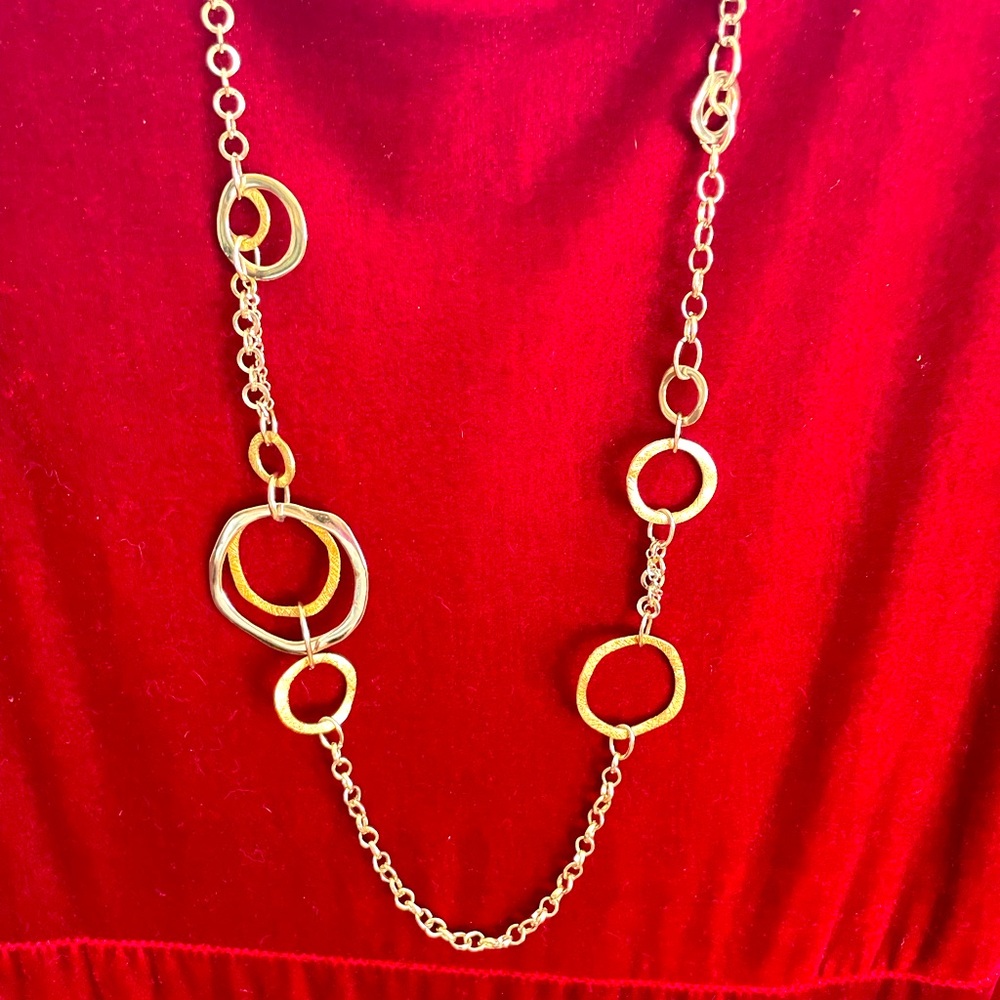 Gold and silver asymmetrical designed necklace